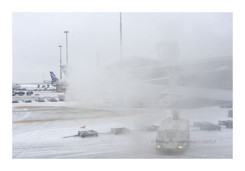 Preparing for departure to JFK, deicing aircraft at HEL - Helsinki airport, Finland. 2011