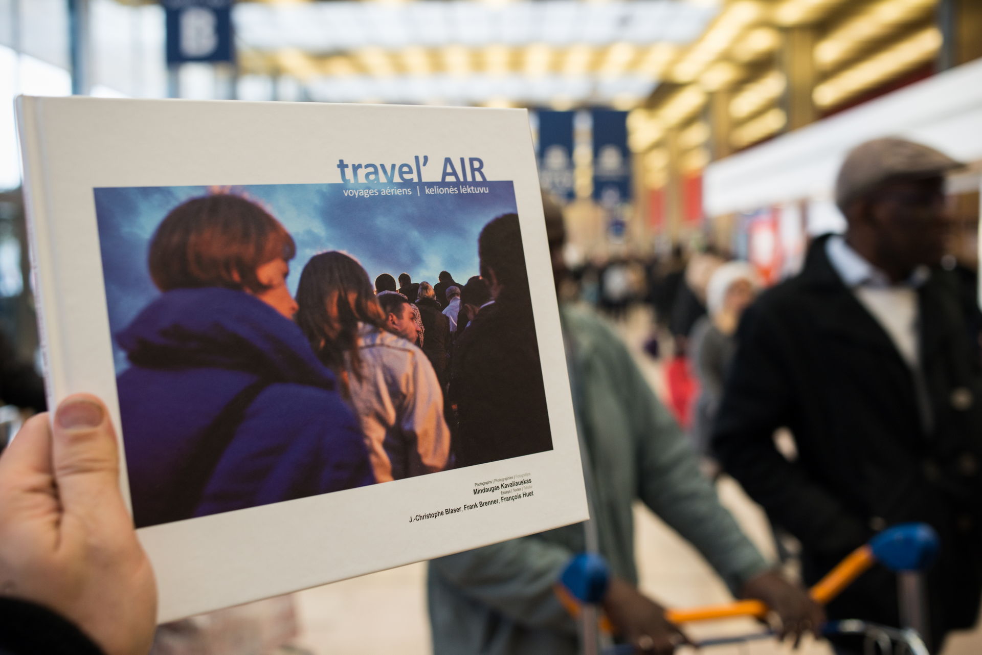 travel'AIR book at an airport terminal