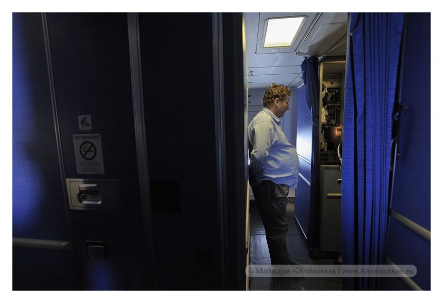 travelAIR. Traveller from South Africa flying to New York is offered some more ice cream. 2010